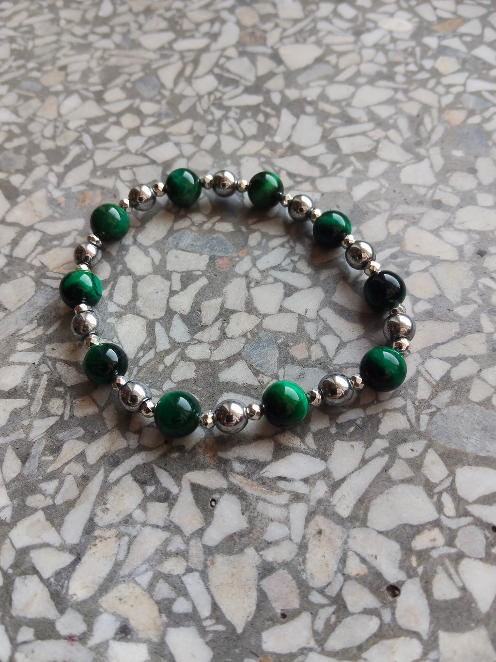 A genuine crystal bracelet green-dyed tiger's eye and hematite silver minerals sizes your lucky charm