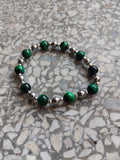 A genuine crystal bracelet green-dyed tiger's eye and hematite silver minerals sizes your lucky charm
